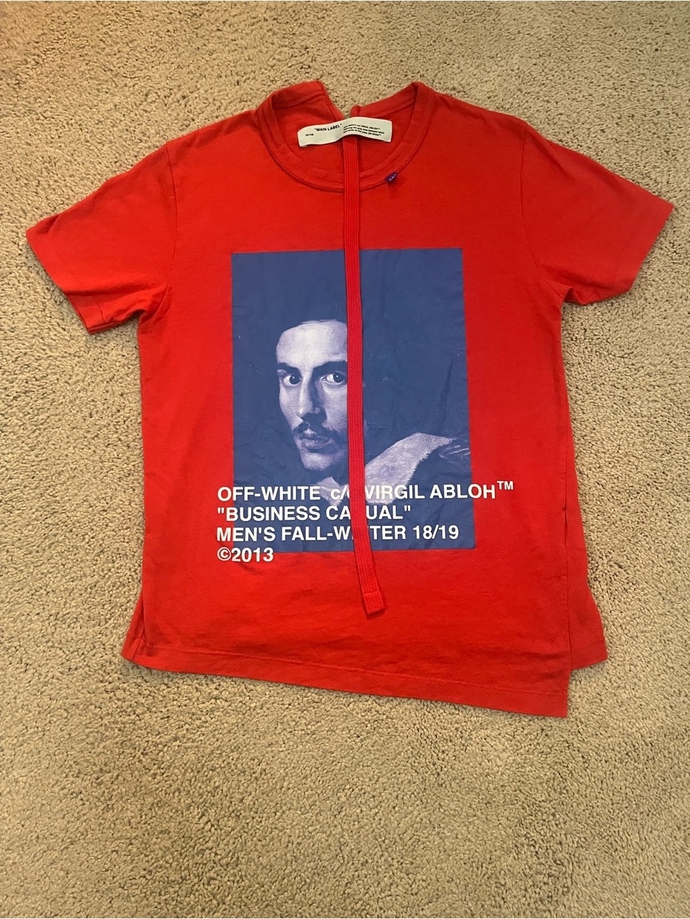 Off-White/Virgil Abloh's Collab T shirt from the 2019 “Business Casual” drop